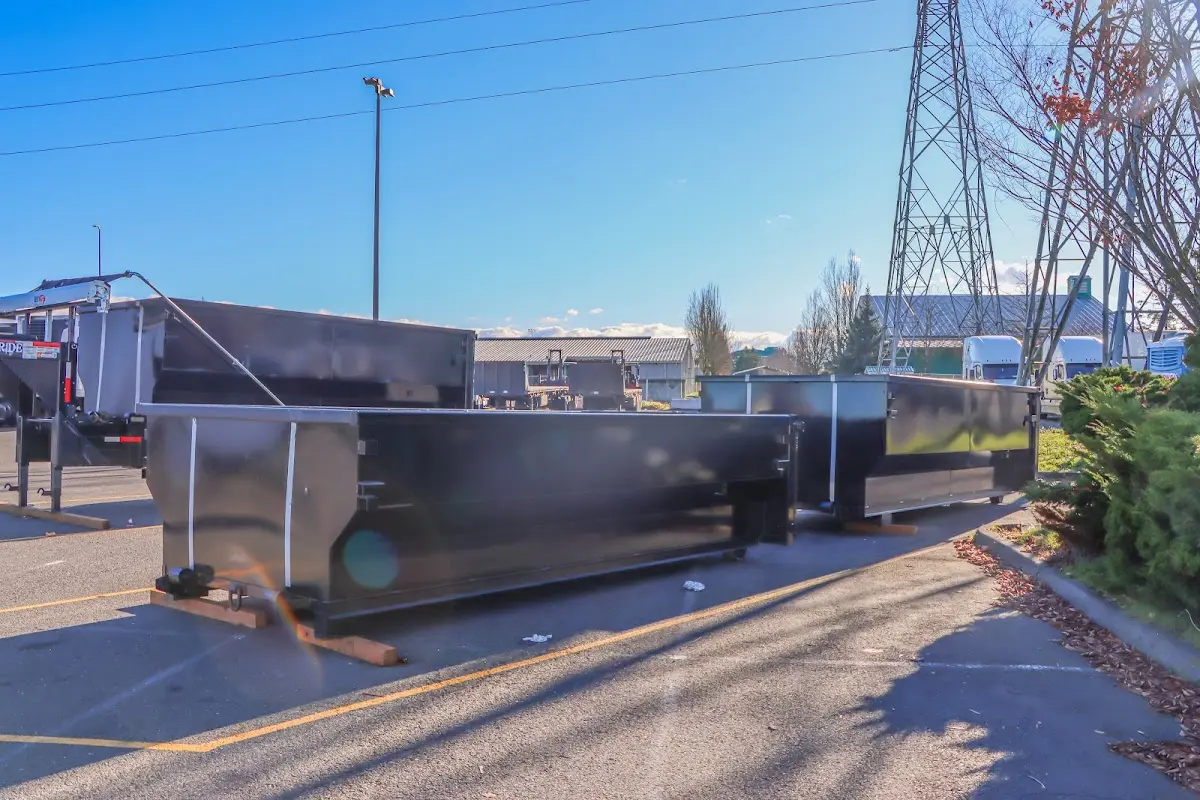 Roll-off dumpster ready for waste disposal at job site for Construction Dumpster Rental in Crockett
